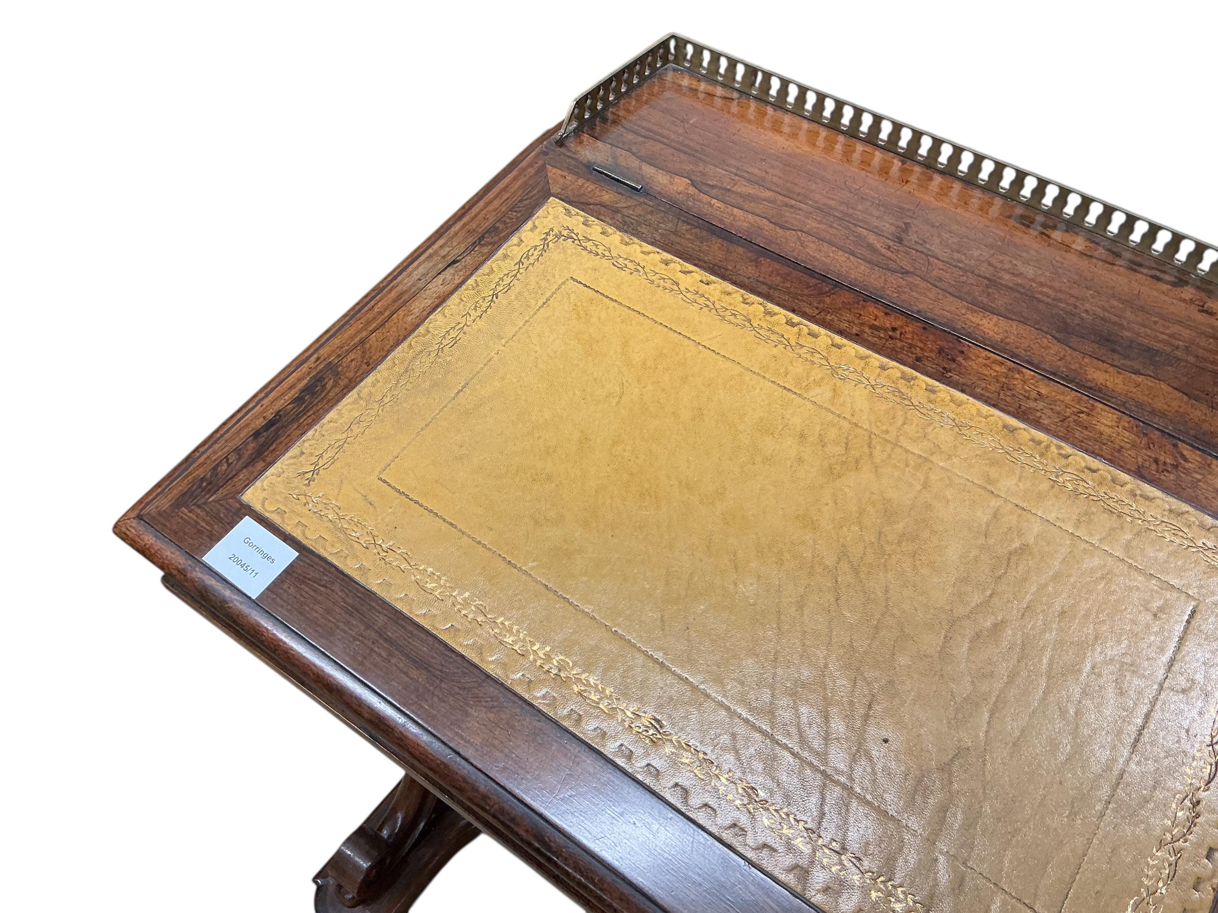 An early Victorian rosewood Davenport, width 60cm, depth 54cm, height 83cm